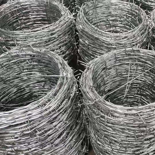 china maufacturer of barbed wire 100meter roll. 