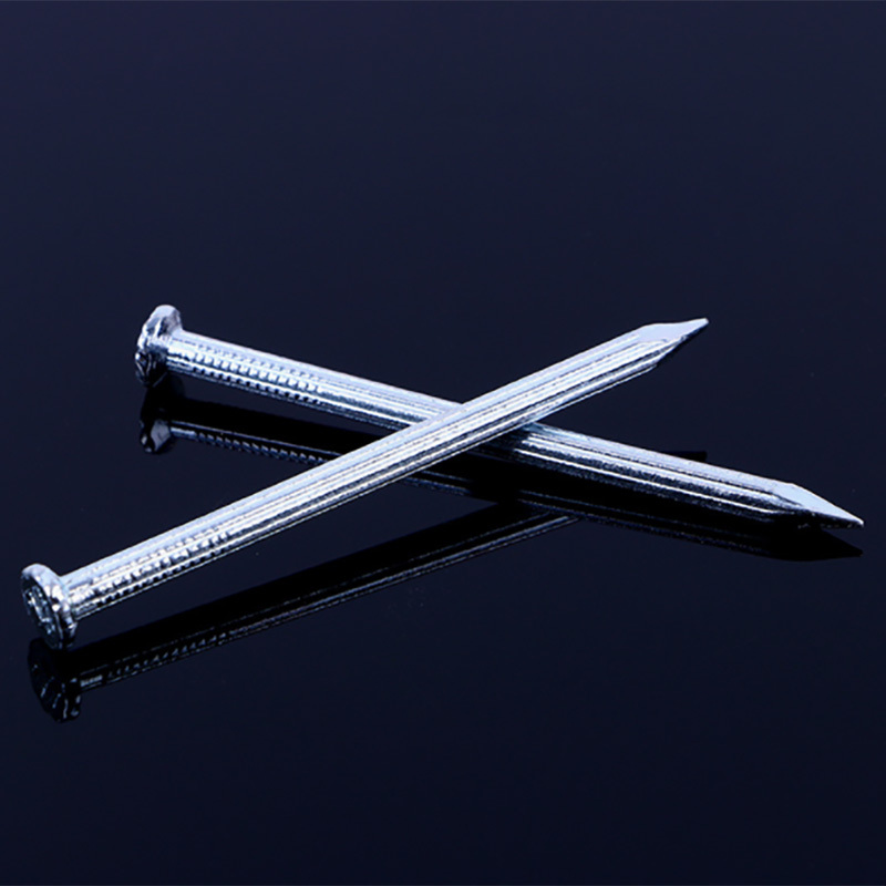 --High hardness and strong penetration: after heat treatment, the hardness can reach HRC40-HRC50, which is far higher than that of ordinary nails. It can be directly nailed into hard bases such as concrete, brick walls and cement mortar layers without drilling holes in advance.
--Straight anti-slip fastening: the nail body is designed with even straight lines, which greatly increases the friction between the nail body and the base material. After nailing, the bite is tight, and it is not easy to loosen and pull out, and the fixation stability is far better than that of smooth cement nails.
--Toughness and fracture resistance: abandoning the pure brittle-hard process, it has both hardness and toughness after quenching and tempering, and it is not easy to break the head and nail during knocking construction, which is suitable for manual and light pneumatic tools.
--Strong specification adaptability: 2-inch length with 3.4mm moderate wire diameter, balanced thickness and length, bearing capacity and construction convenience, and high versatility.
--High cost performance: controllable raw material cost, low mass production cost, strong durability, suitable for mass use in large-scale projects and export standards.